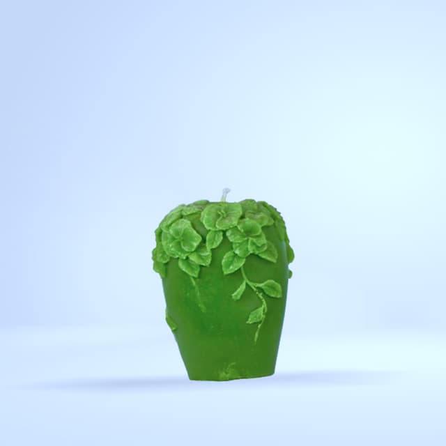 Bougie sculptée verte forme pomme/fleurs