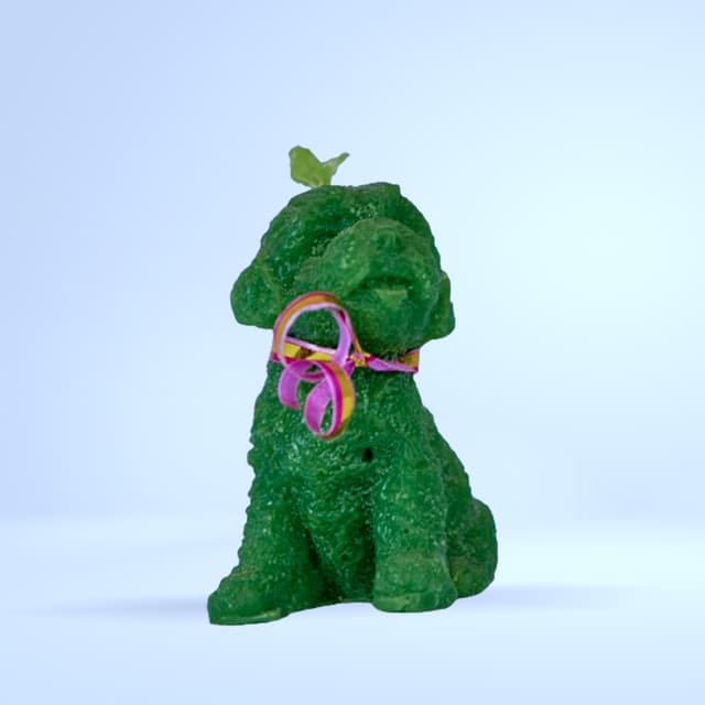 Bougie sculptée chien vert avec ruban