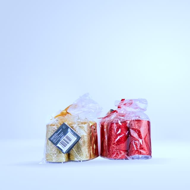 Duo bougies bâtons pailletées (or/rouge, emballées)